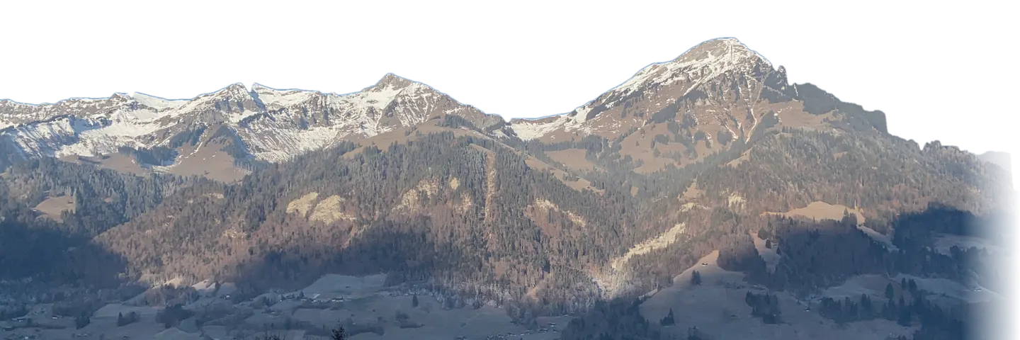Der Niesen im ersten Morgenlicht, gesehen aus dem Fenster in Scharnachtal